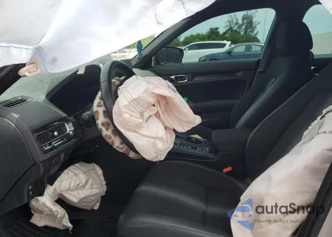 2022 Honda Civic Sport z USA, uszkodzony, nr VIN 2HGFE2F58NH573047